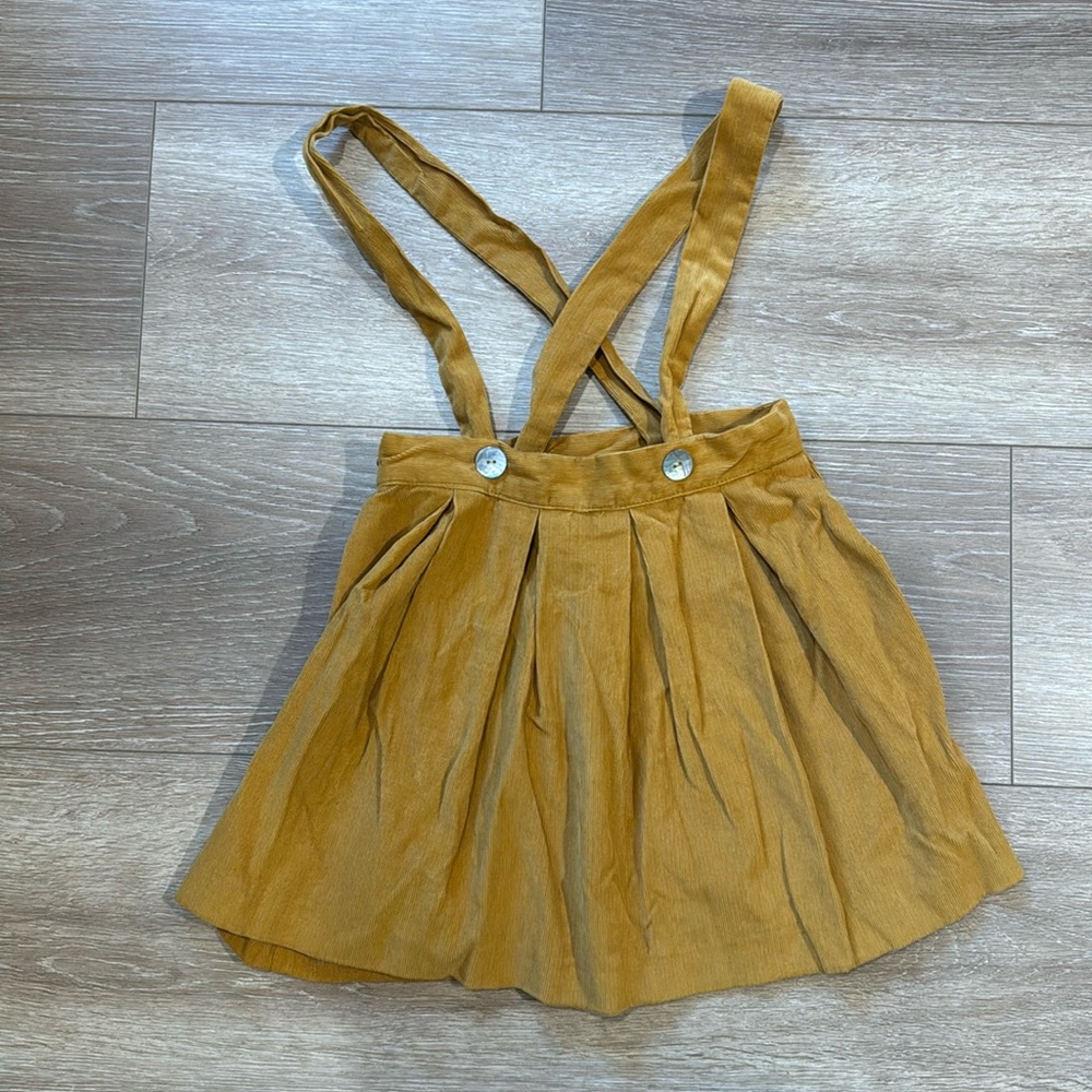 Coco au Lait corduroy skirt with attached suspenders